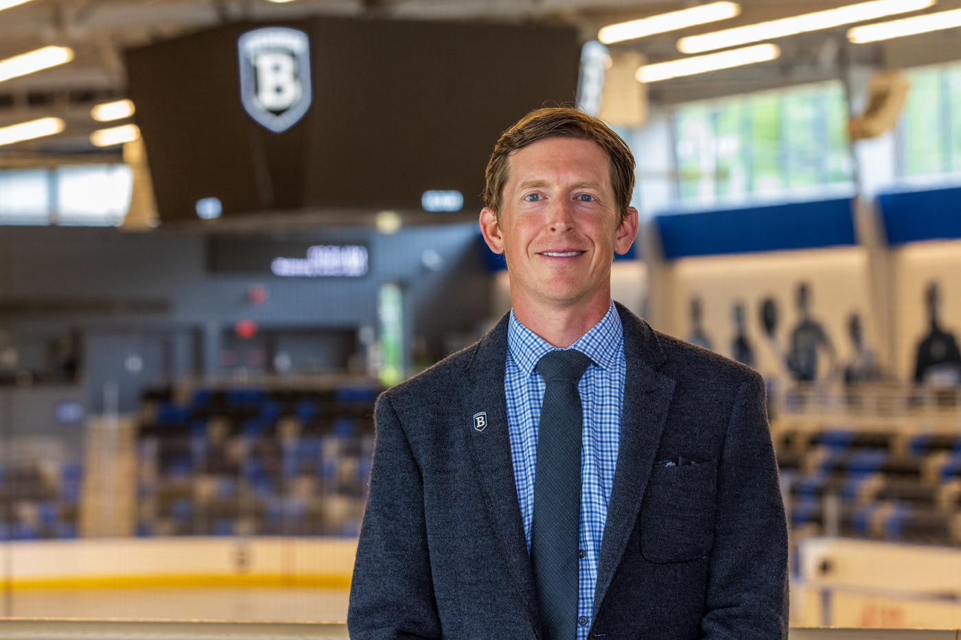 Andy Jones stands in the Hockey Arena