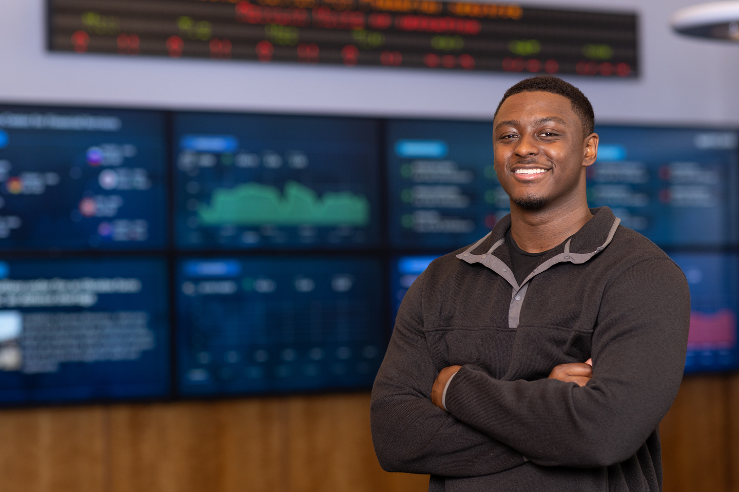 Bentley University alumnus Tyler Staggs-Burgess ’24 in the Bentley Trading Room