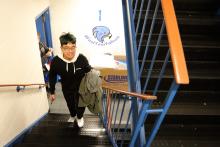 first year student walking up steps on move in day 