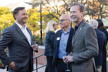 a group meets by the Great Benefactors dedication 