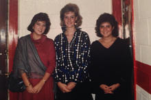 Three women in a Bentley dorm room