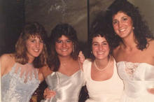 Four women dressed for a dance