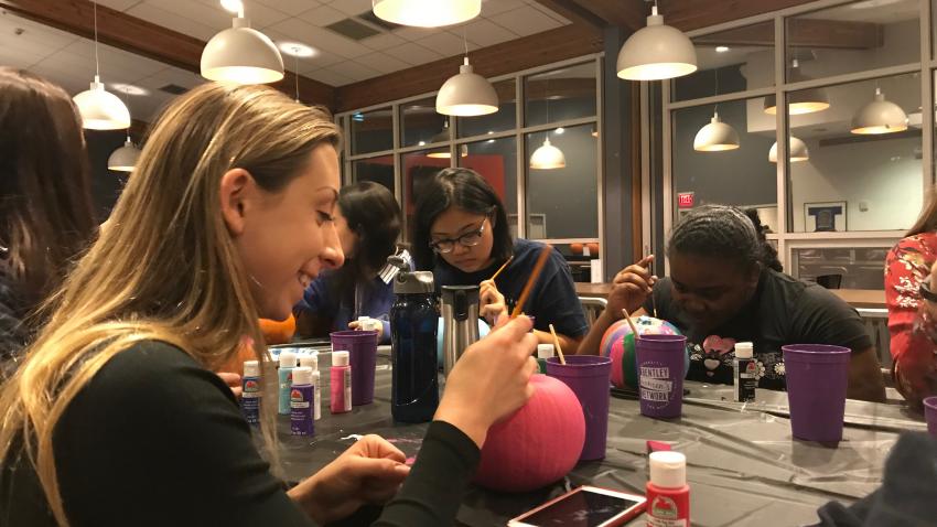 Ladies Painting Pumpkins 