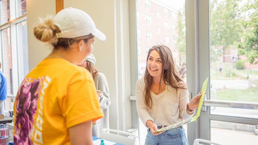 Wellness Educator talking to a student