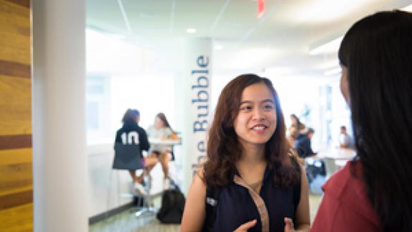 student talking in student center