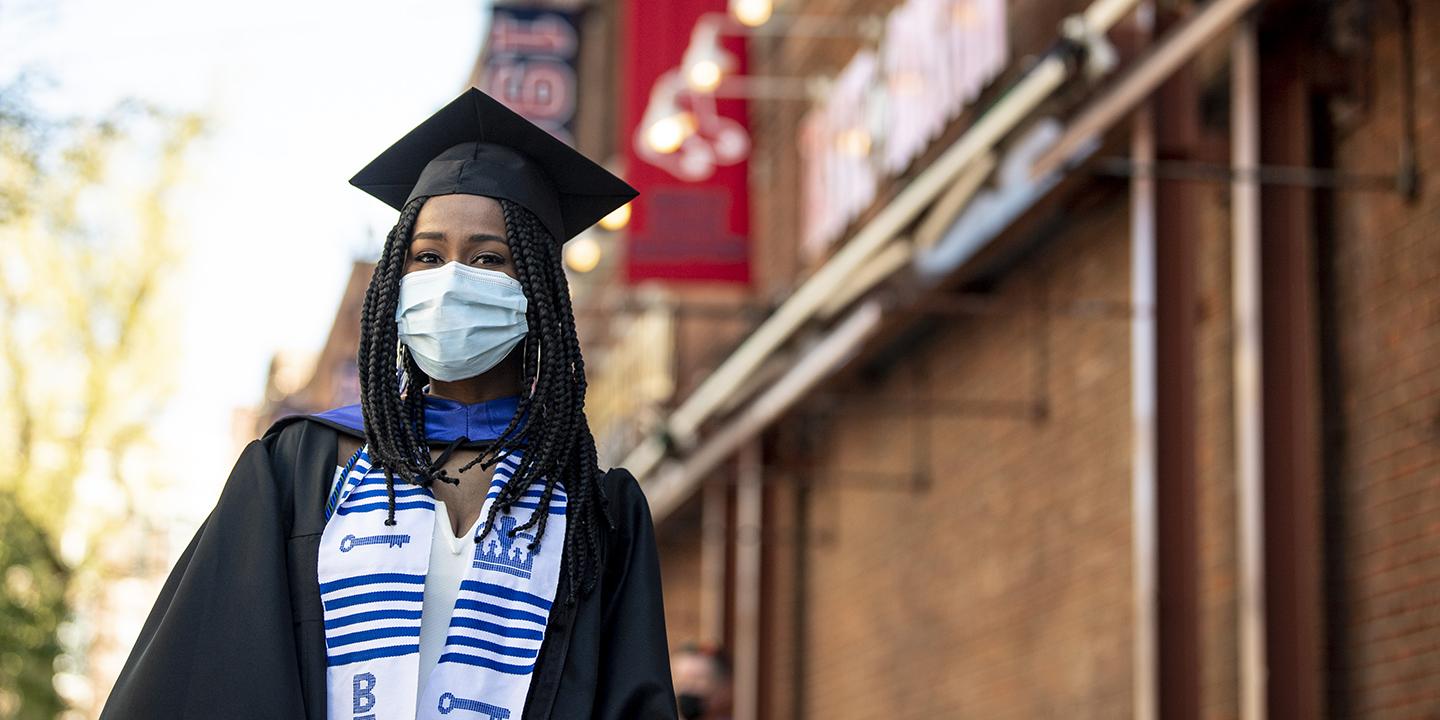 Student at Bentley commencement at Fenway Park