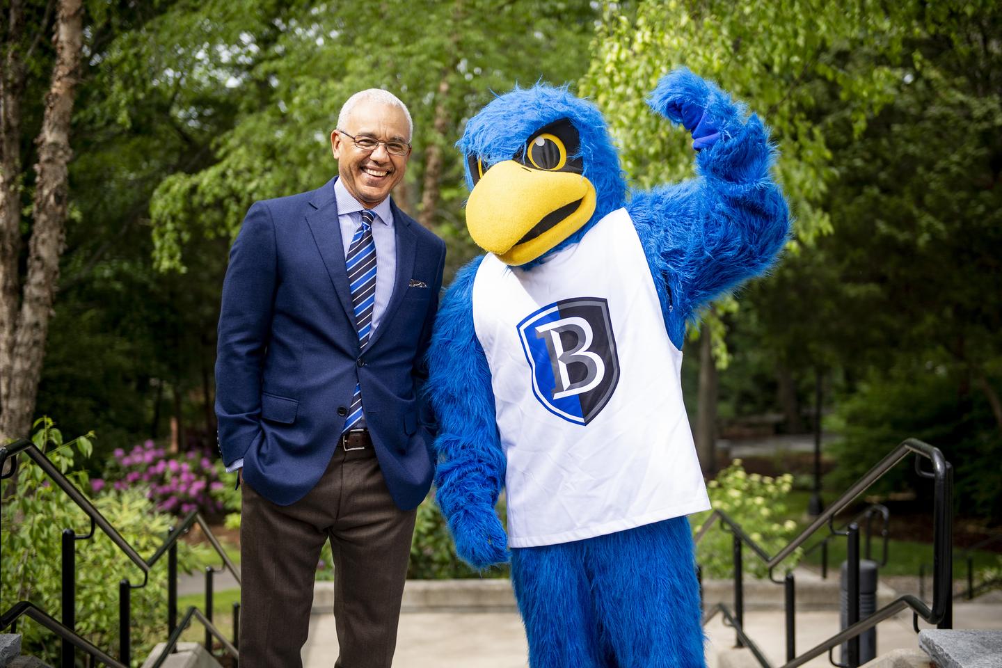 Bentley University President Brent Chrite with Flex the university mascot