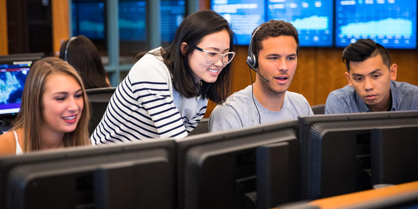 People working in the trading room