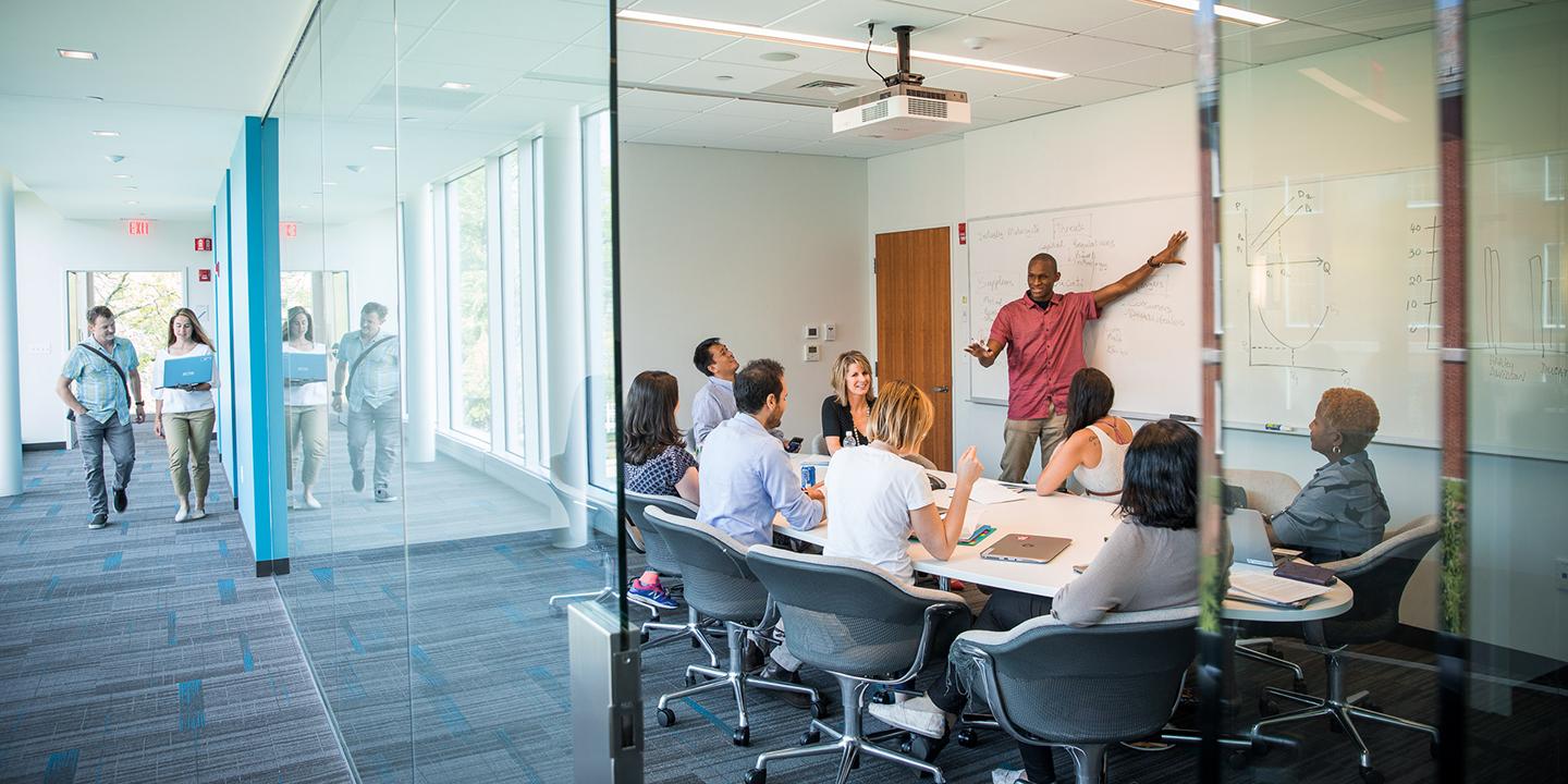 people working in a conference room