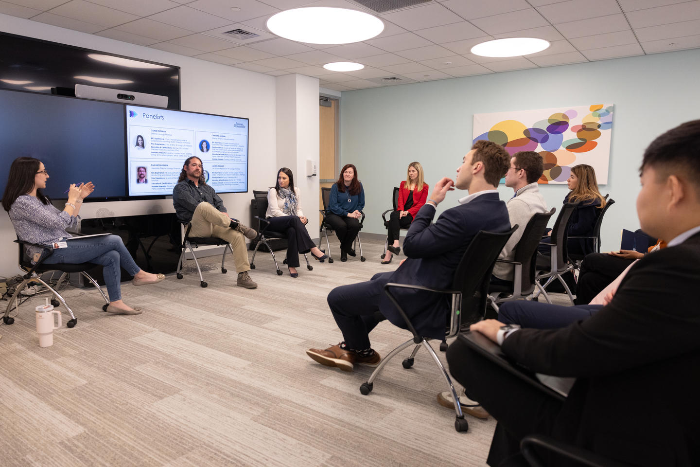 Students listen to panelists at Boston Scientific