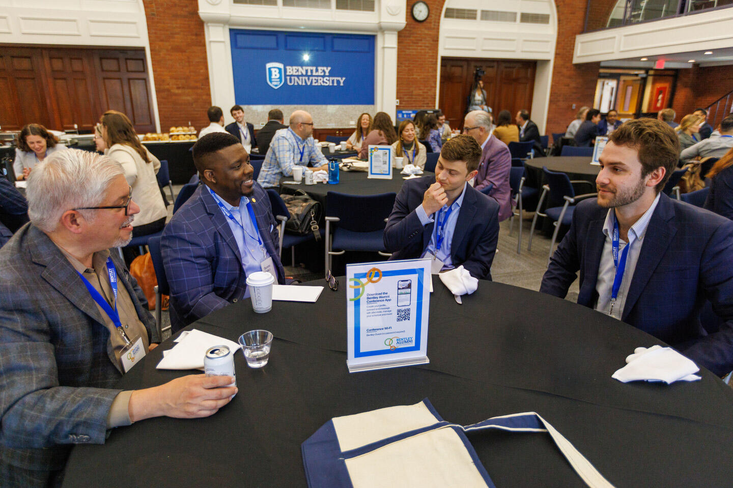 Alumni Conference - alumni sitting around a table