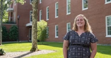 Erin Sutermeister standing on the LaCava quad in the sunshine