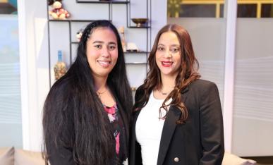 Anyfern Gonzalez and Isaura Beltre standing side-by-side