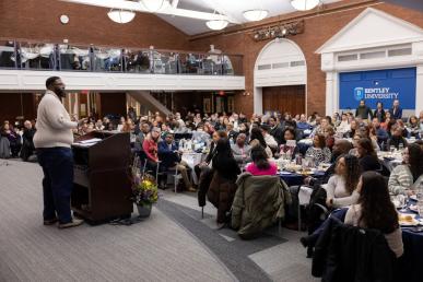 Keynote speaker Anthony Abraham Jack addresses a crowd of 400 at Bentley University's MLK Celebration