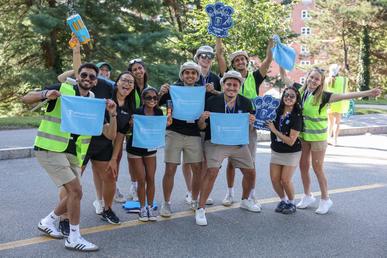 Bentley students volunteers enthusiastically welcoming the Class of 2028